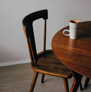 Apotheke Charcoal Candle Mood kinfolk vibes teak chair and table coffee mug 